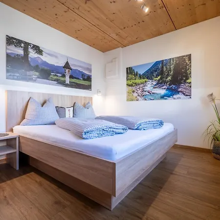 Alpenapart Singer - Contactless Check-in Daire Reutte